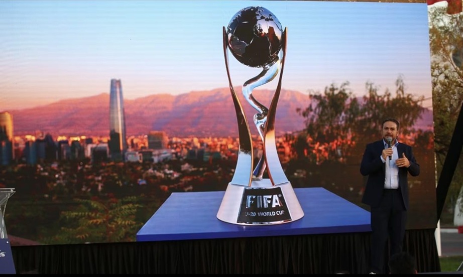 One-month World Cup countdown stadium atmosphere with fans and trophy