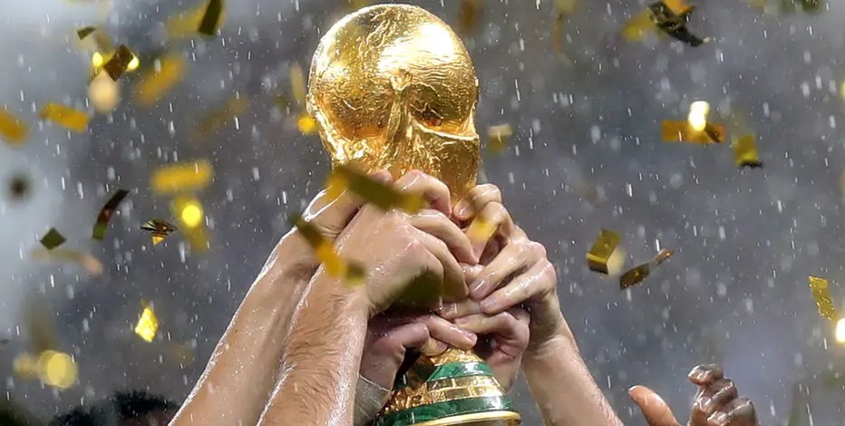 One-month World Cup countdown stadium atmosphere with fans and trophy