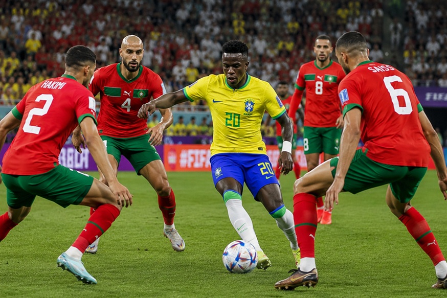 Morocco vs Brazil World Cup match featuring Achraf Hakimi and Vinícius Júnior in action