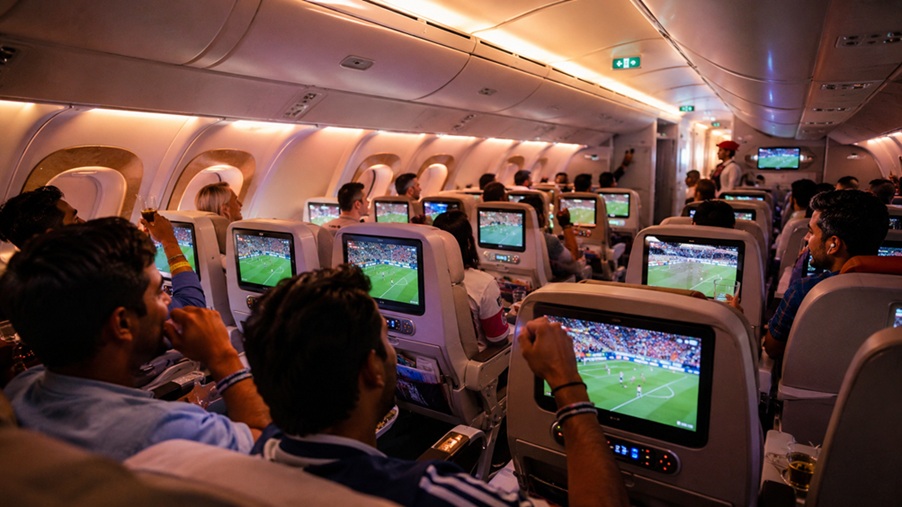 Emirates World Cup Live passengers watching FIFA World Cup Final on ICE entertainment system at 40,000 feet