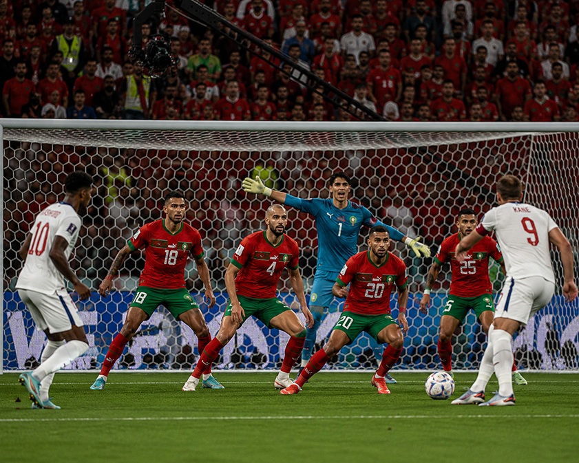 Morocco World Cup Semi-Final hopes with Achraf Hakimi and Morocco national football team celebrating before facing France