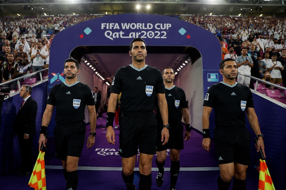 UAE referee team campaign officials officiating at the FIFA World Cup with VAR technology