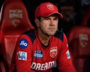 Ricky Ponting IPL Heartbreak showing Ponting sitting emotionally in the Punjab Kings dugout after a tough IPL loss